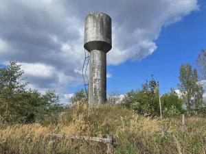 Водонапорная башня в аг.Замосточье, инв. №104 (Витебская обл., Докшицкий р-н, Бегомльский с/с, аг.Замосточье, ул. Механизаторская, 3)